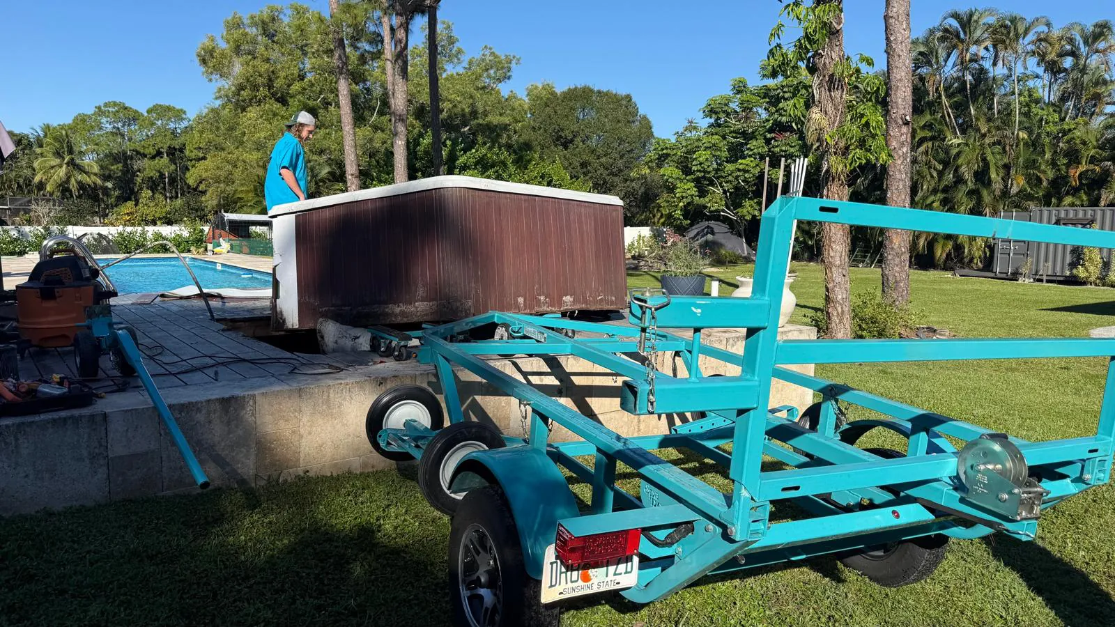 Old hot tub loaded onto the spa trailer