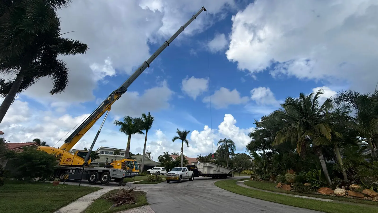Crane set up in the street for the lift