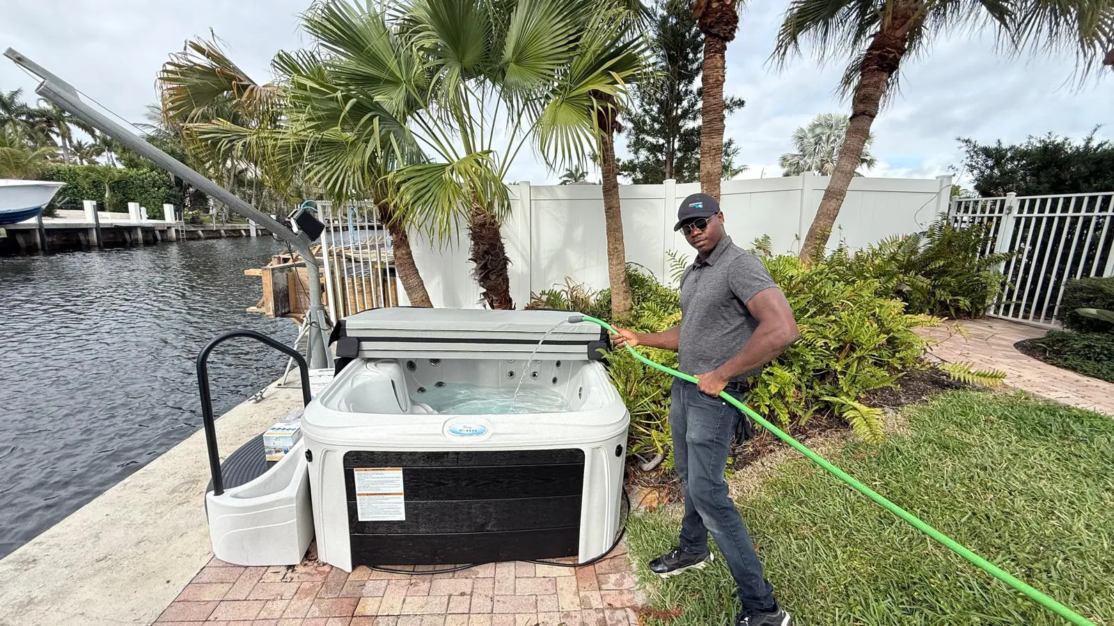 Plug-and-play hot tub beside a canal in Deerfield Beach