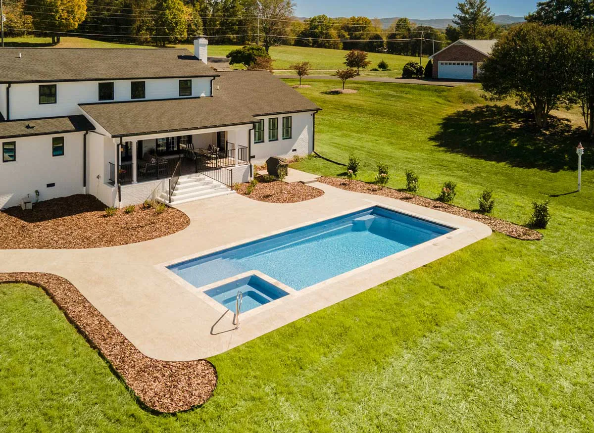Latham Astoria 12 fiberglass pool installed in a backyard