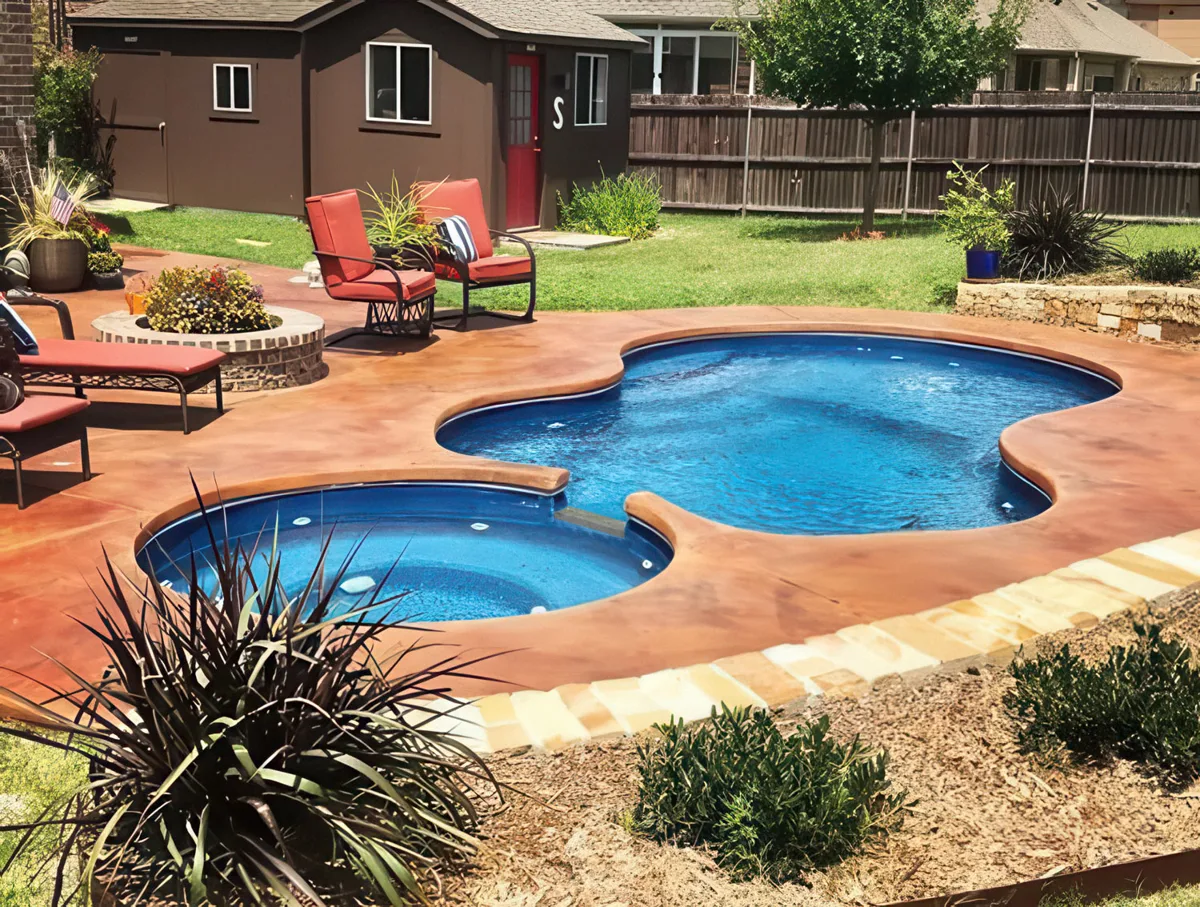 Latham Axiom 12 Deluxe fiberglass pool installed in a backyard