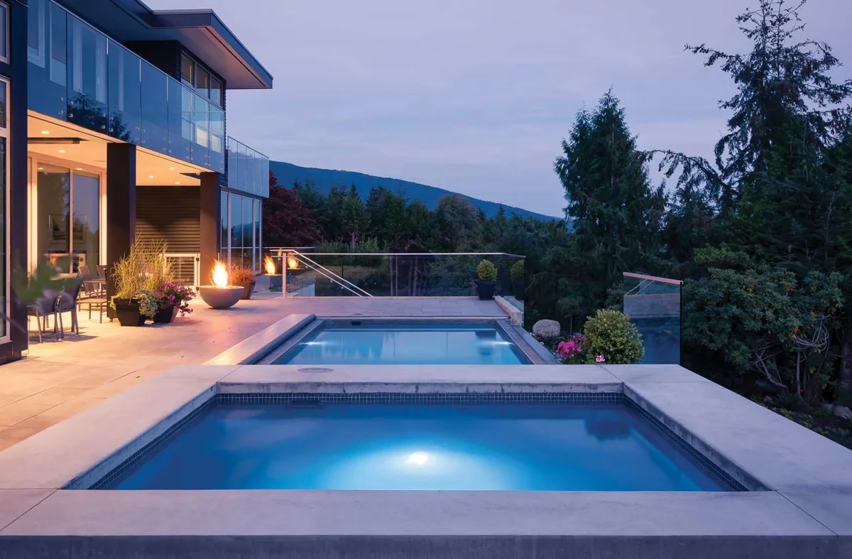 Latham Delray fiberglass pool installed in a backyard