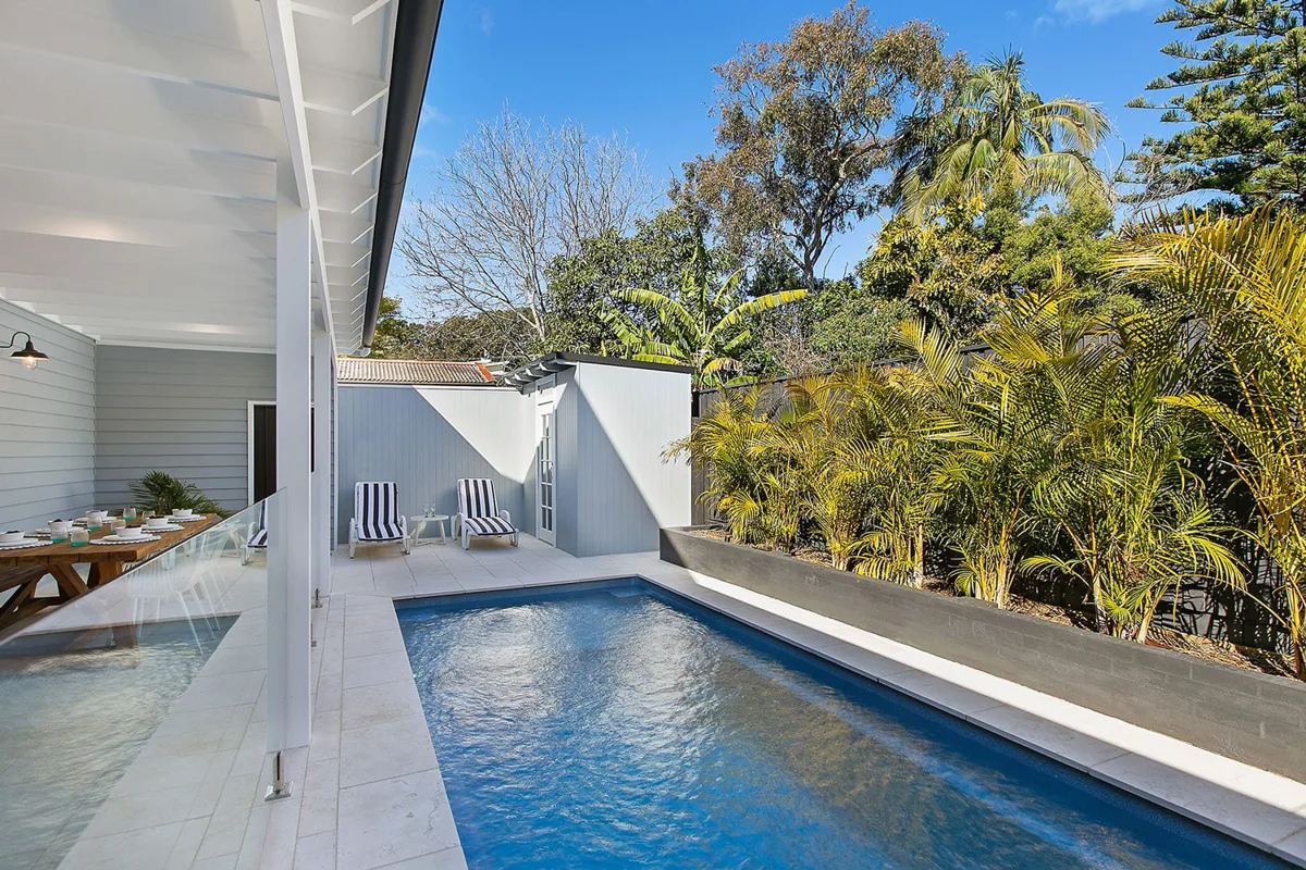 Latham Enchantment 9.21 fiberglass pool installed in a backyard
