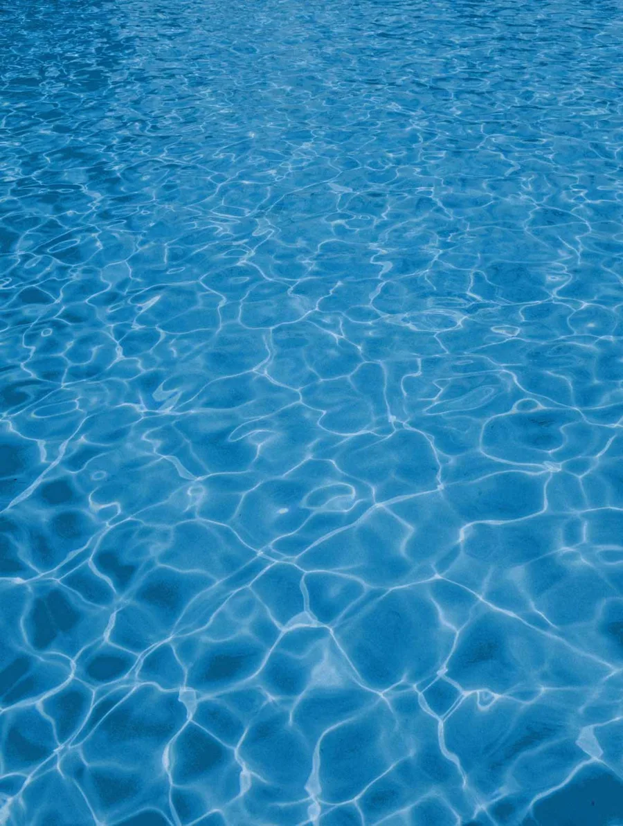 Pool water over a Latham Ocean Blue fiberglass shell