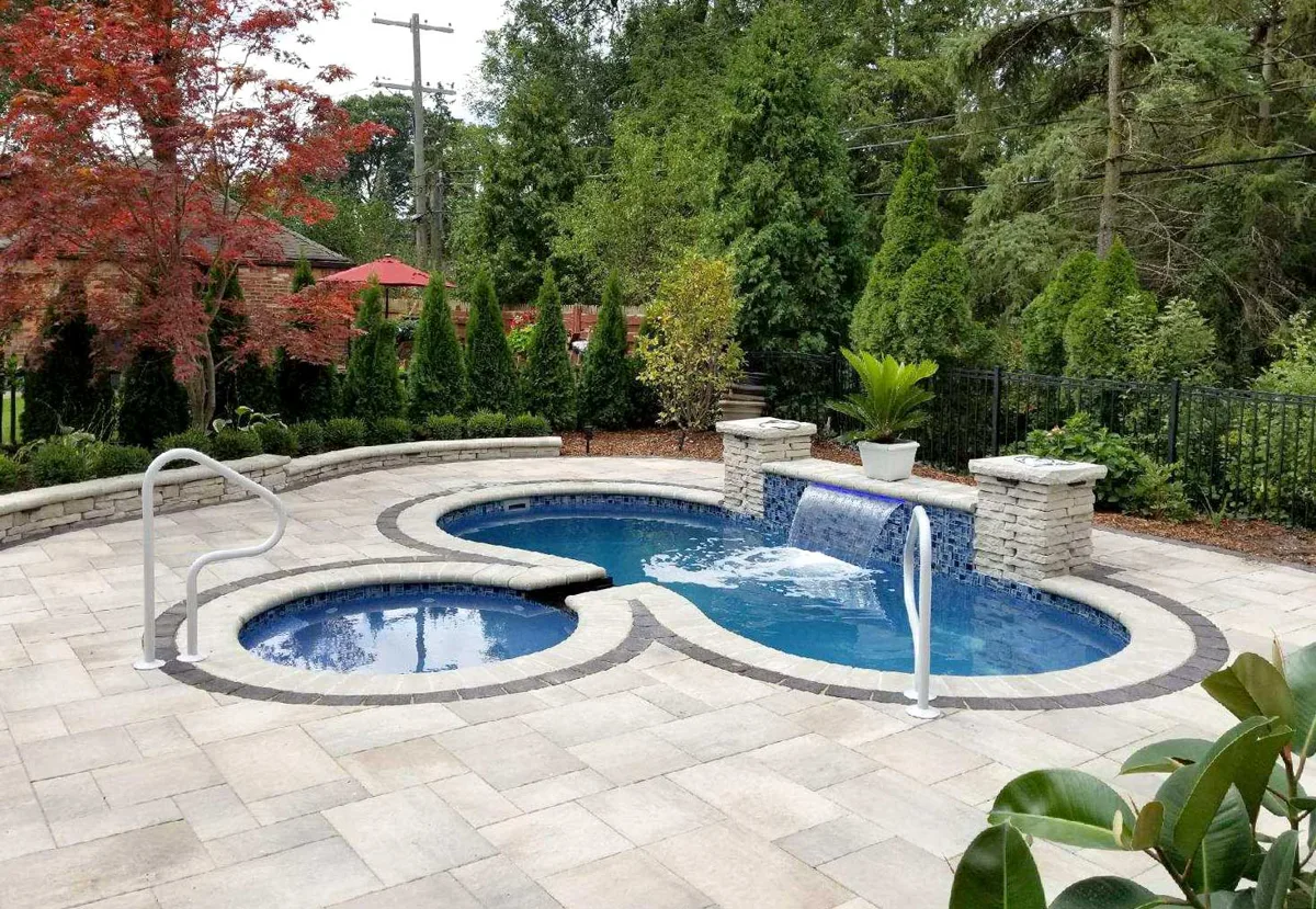 Latham Jamaica 10 fiberglass pool installed in a backyard