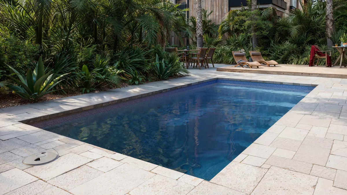 Latham Milan 10.20 fiberglass pool installed in a backyard