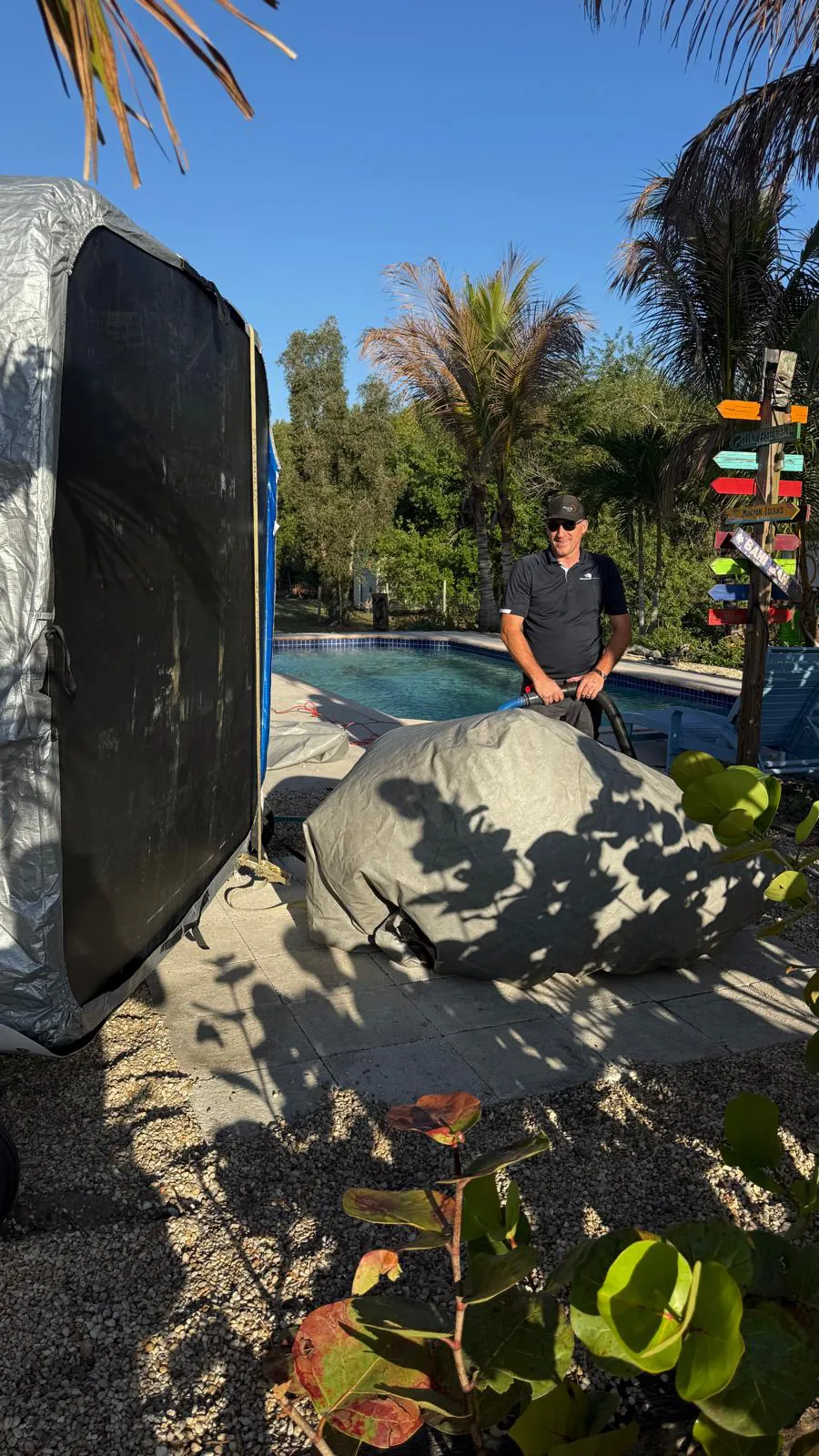 Hot tub being lowered onto an inflated cushion