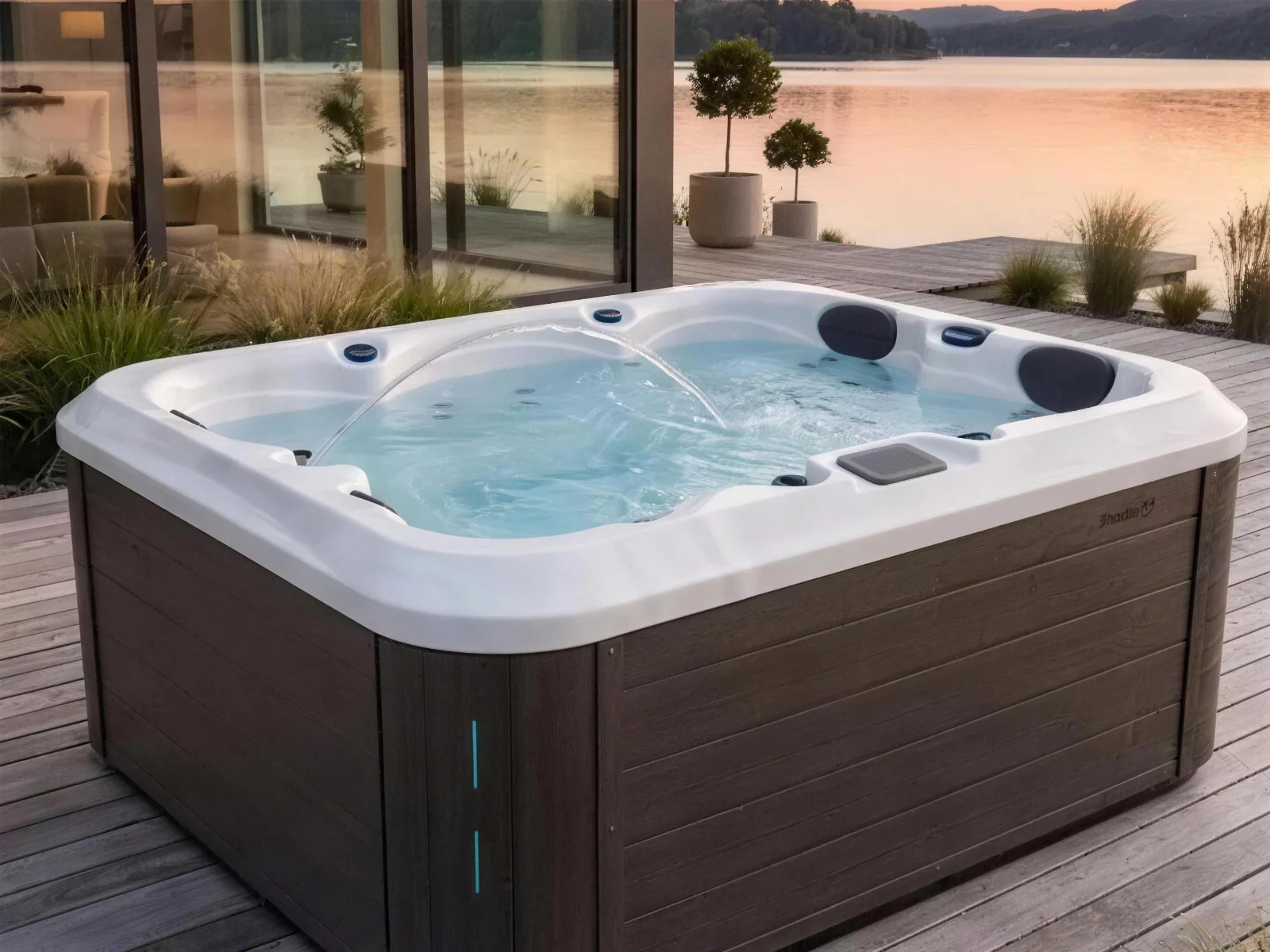 Maple Spas M320 hot tub on a deck at sunset
