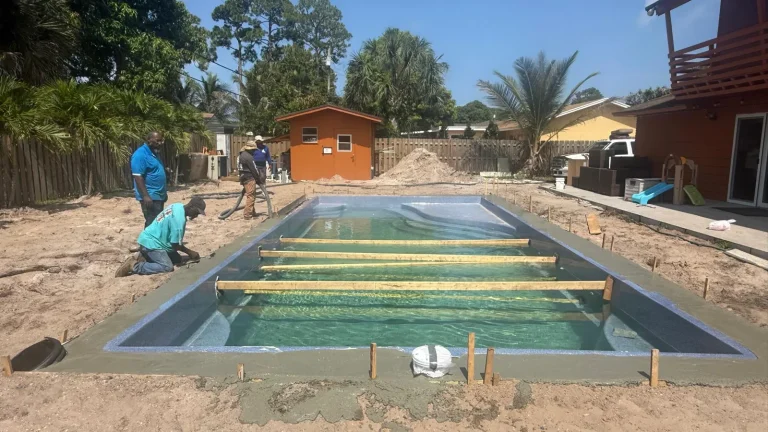 Crew working on the pool edge