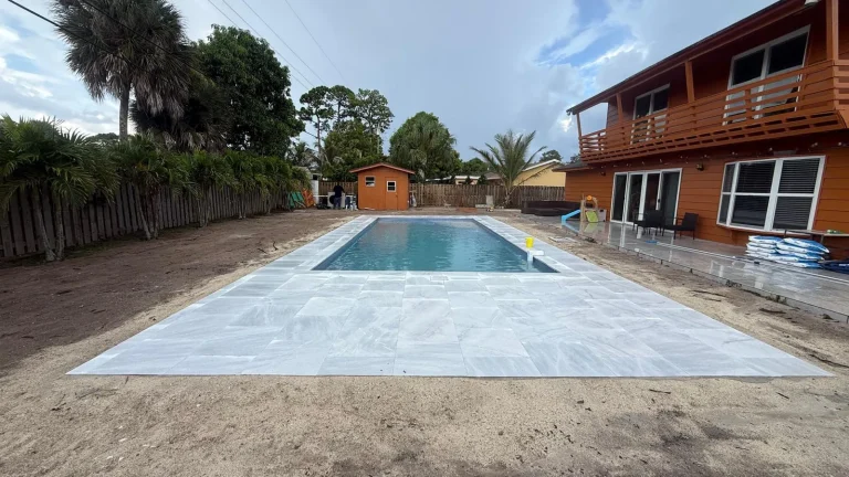 Finished fiberglass pool with its new deck