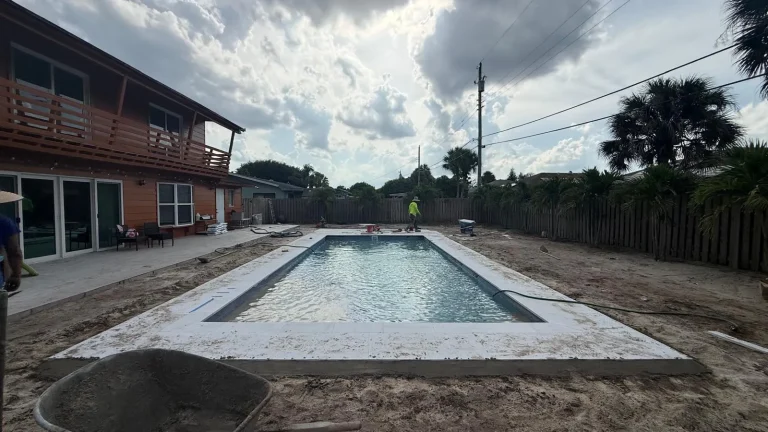 Finished fiberglass pool seen along its length