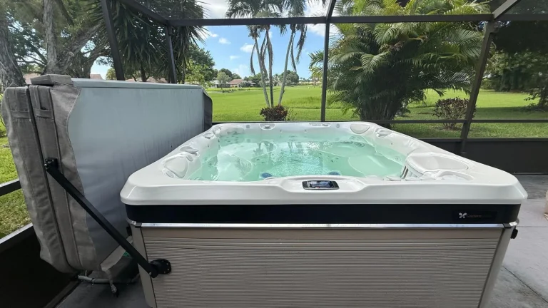 Hot tub with its cover lifter open