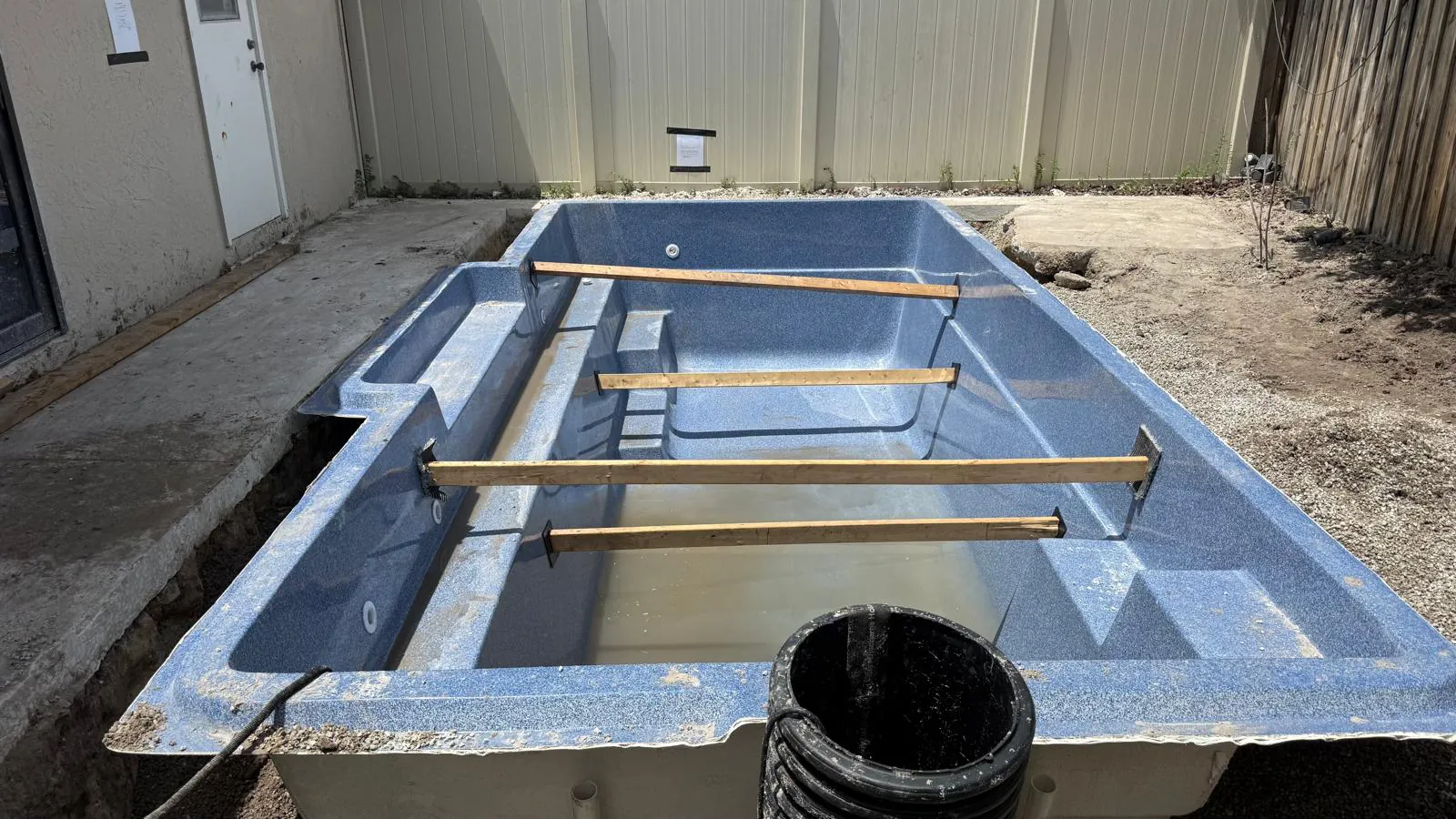 Tuscan 11.20 shell braced across the top inside the old deck