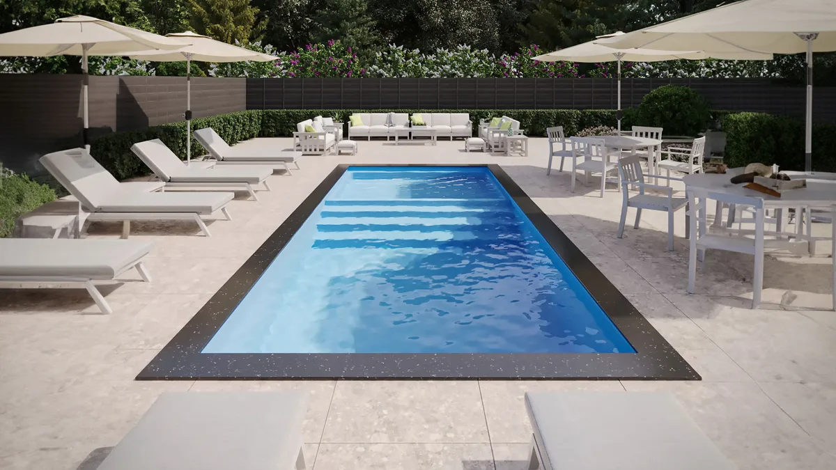 X-Pools California fiberglass pool with wide entry steps beside a gravel garden