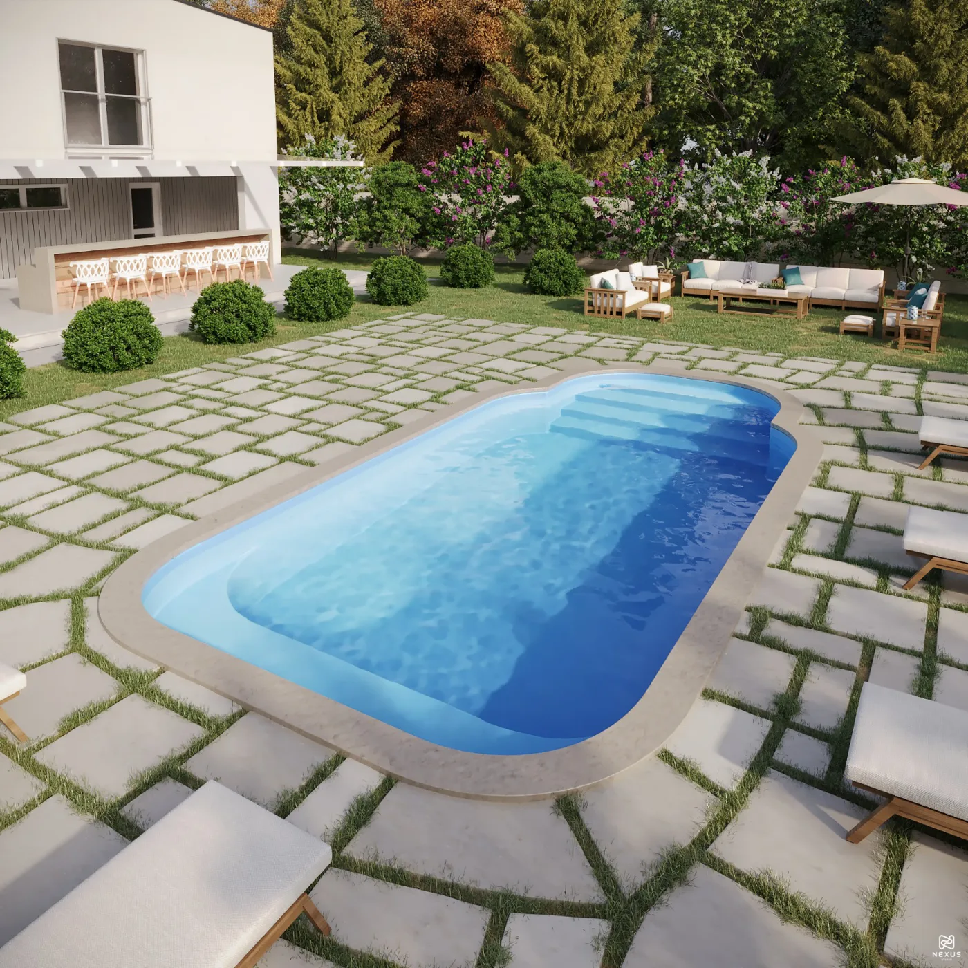 X-Pools Daytona fiberglass pool set in a stone and grass patio