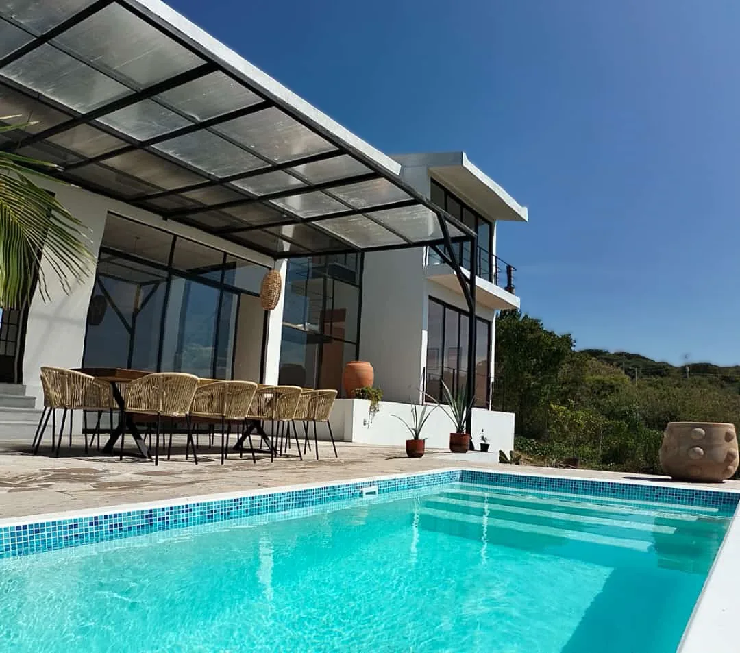 X-Pools Miami fiberglass pool beside a modern terrace